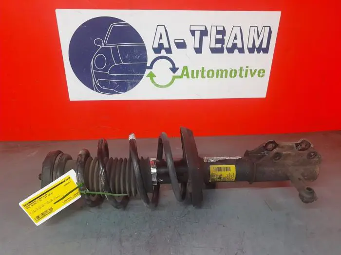 Fronts shock absorber, left Opel Astra