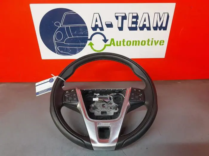 Steering wheel mounted radio control Volvo V60