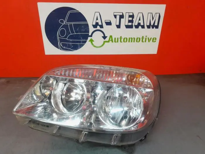 Headlight, left Fiat Doblo