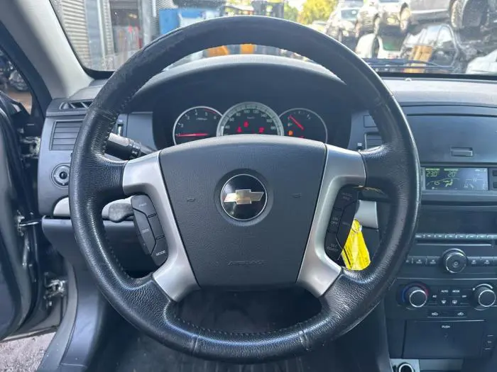 Steering wheel mounted radio control Chevrolet Epica