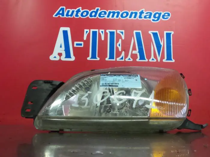 Headlight, left Ford Courier