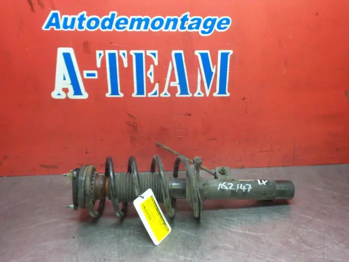 Fronts shock absorber, left Ford Connect